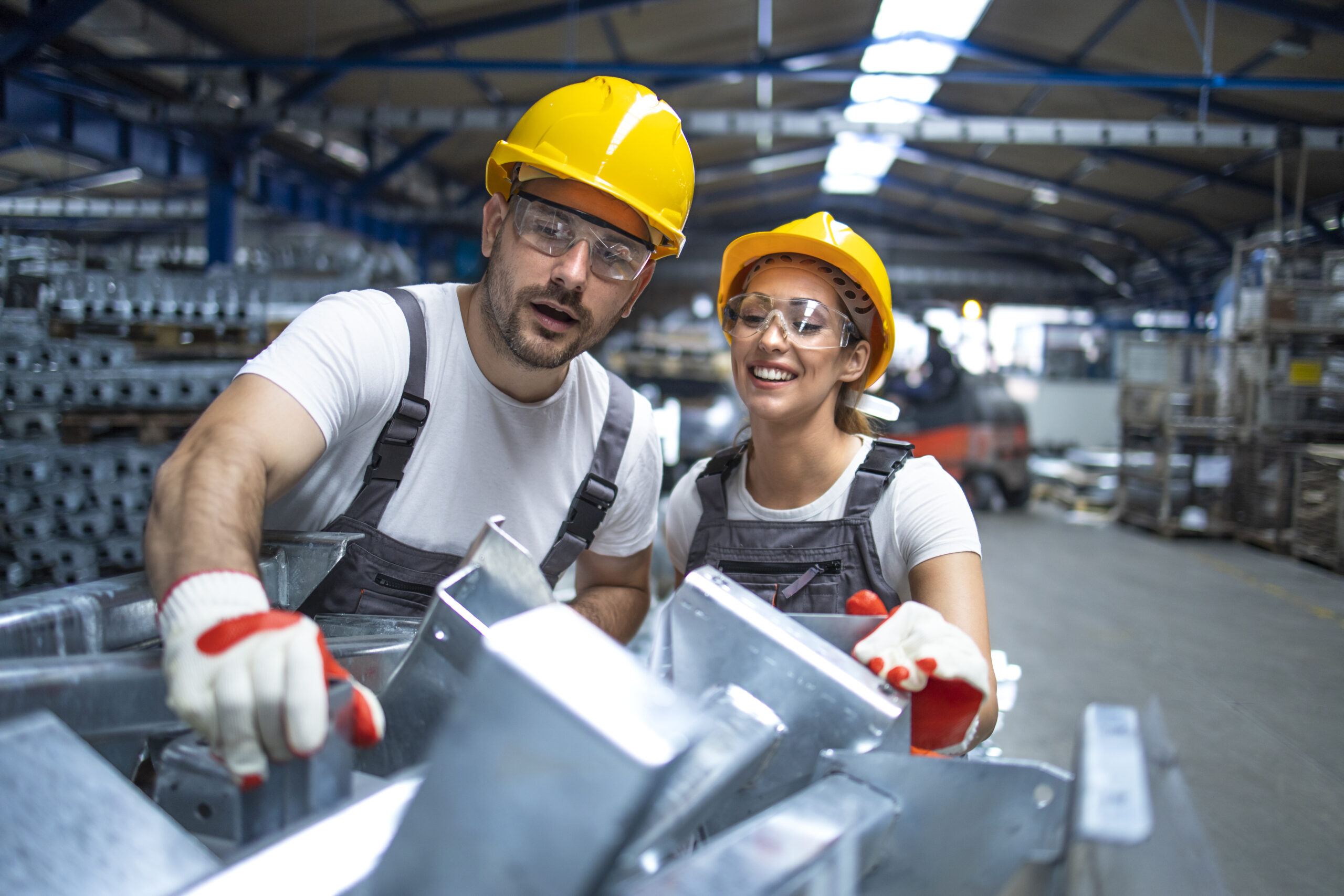Factory workers working in production line.